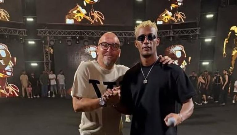 محمد رمضان ومنظم الحفل باسر الحريري