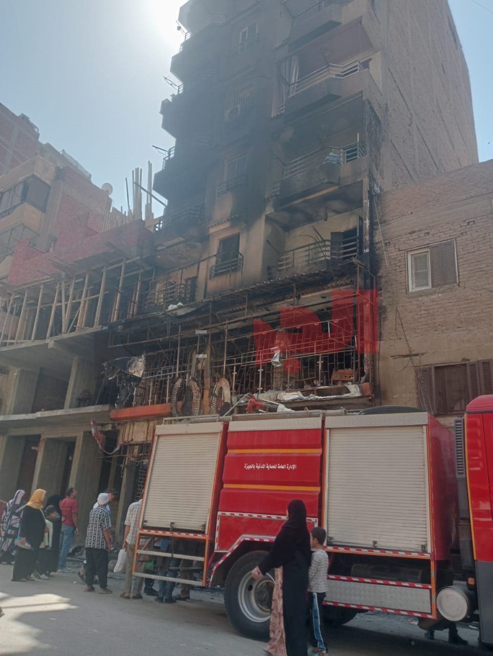 النيابة تعاين موقع حريق فيصل الذي أودى بـ3 أرواح وأصاب11 أخرين