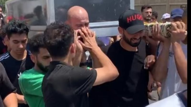 باهر المحمدي في تشيع جثمان والده