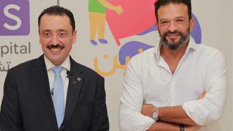 الدكتور محمد رزق وأيمن عباس