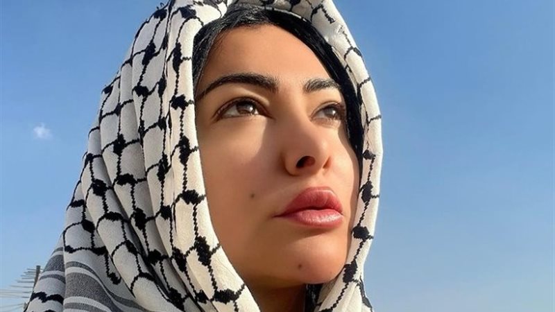 ميرهان حسين بالكوفية الفلسطينية