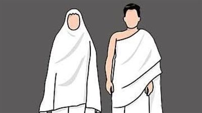 حكم ارتداء المرأة ملابس باهظة الثمن لالتقاط بعض الصور بالكعبة؟