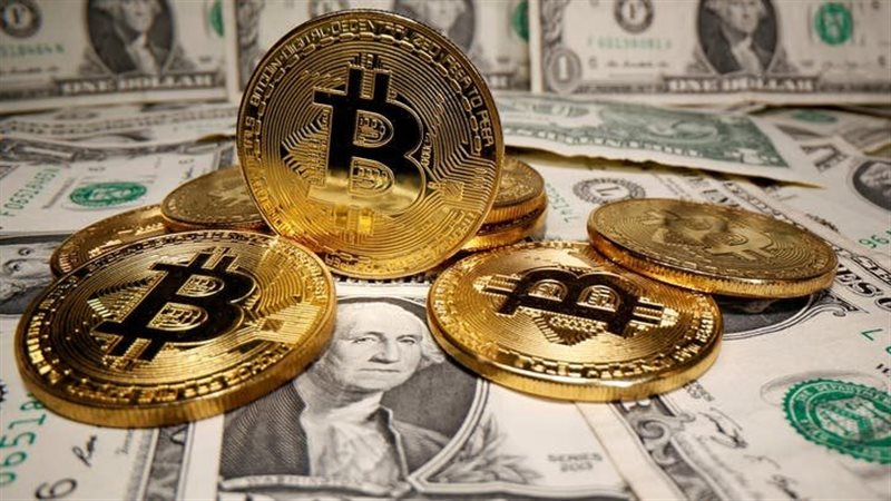 العملة الأمريكية مقابل العملات الرقمية