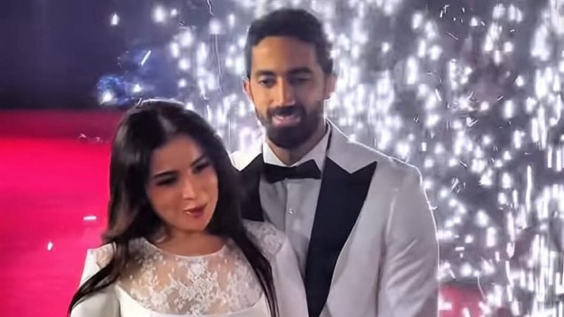 مي عز الدين وزوجها