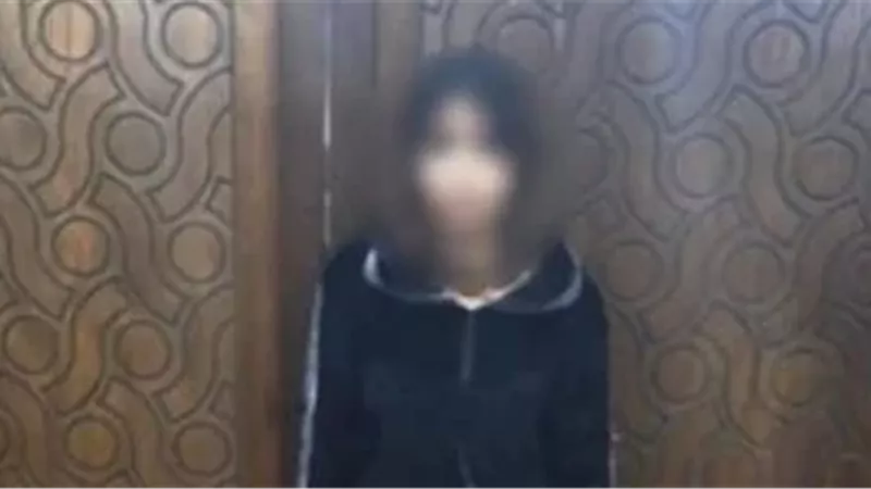 المتهمة عقب القبض عليه