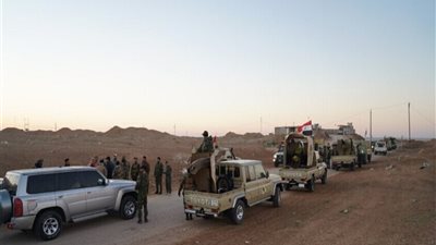 العراق يعلن نقل سجناء داعش من سوريا 