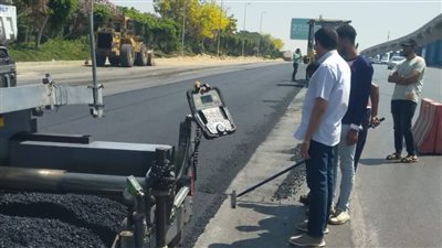 جهاز القاهرة الجديدة يواصل تطوير محور التسعين الجنوبي بالتجمع الخامس