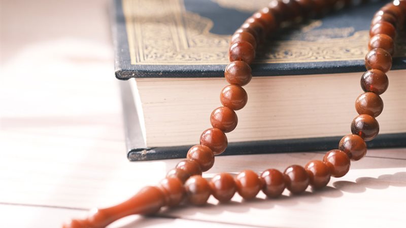 حكم صباعة آيات من القرآن على العملات 