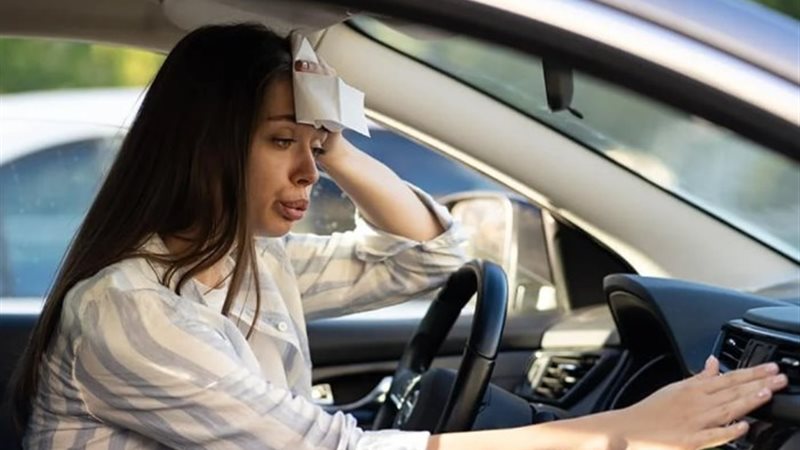 السيارات وارتفاع درجات الحرارة - تعبيرية